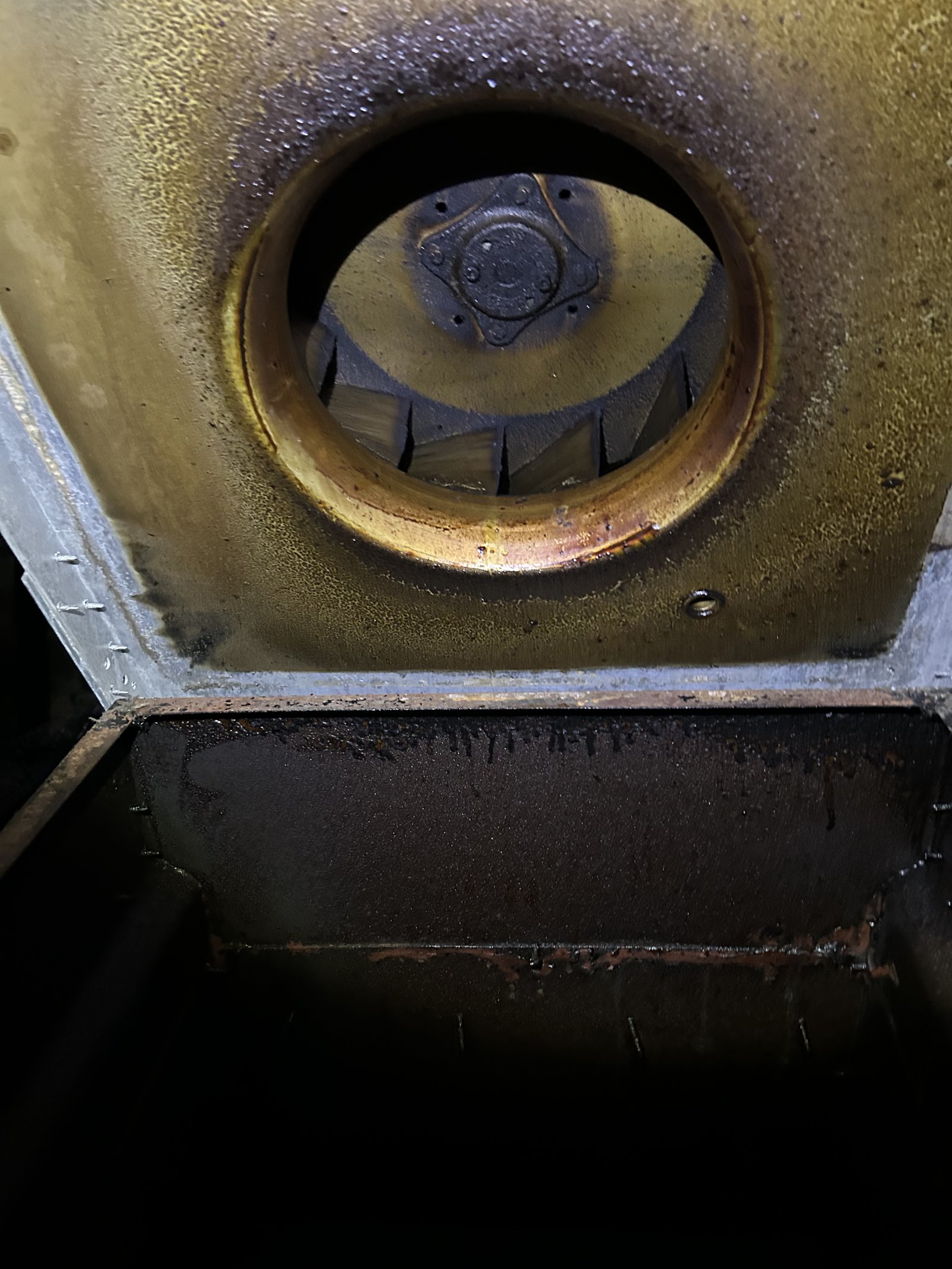 Greasy exhaust fan system with visible grime